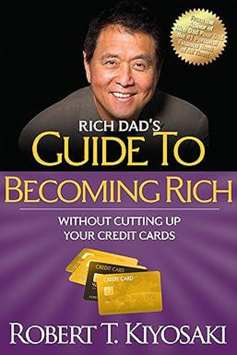 May include: Book cover with a purple background and gold text. The title is "Rich Dad's Guide to Becoming Rich Without Cutting Up Your Credit Cards." The author is Robert T. Kiyosaki.