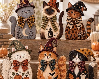 May include: Six decorative wooden cat figurines, each wearing a pointed hat and a bow tie. The cats feature various patterns including moons, stars, pumpkins, bats, ghosts, and spiderwebs in colors of orange, black, brown, and grey.