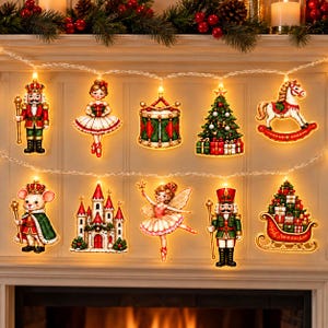May include: A string of LED Christmas lights featuring ten illuminated ornaments including a nutcracker, a ballerina, a drum, a Christmas tree, a rocking horse, a mouse in a cape, a castle, a fairy, a second nutcracker, and a gift-filled sleigh.