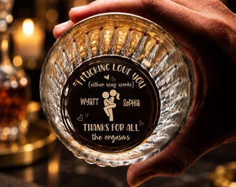 May include: A clear, faceted glass tumbler featuring an etched design on the base. The text reads: I FUCKING LOVE YOU (either way works), WYATT, SOPHIA, and THANKS FOR ALL the orgasms, accompanied by a central graphic of two figures embracing.