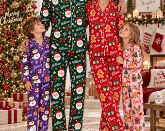 May include: Four people wearing matching button-down pajama sets. The adult on the left wears green with Santa faces, the adult on the right wears red with gingerbread men, the child on the left wears purple with snowmen, and the child on the right wears pink with reindeer.