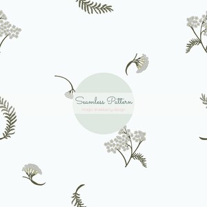 May include: A seamless pattern design featuring white flowers and green fern-like leaves scattered on a white background. A light green circle in the center contains the text "Seamless Pattern" and "magic strawberry design".