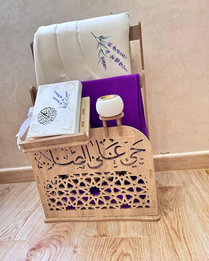 Moroccan Islamic prayer corner organizer styled for women — purple prayer set, Quran stand, prayer mat and tasbih holder. Carved wood MDF with arabesque cutouts and Arabic calligraphy. Elegant Islamic home decor and Islamic gift for women. Handcrafted in Morocco.