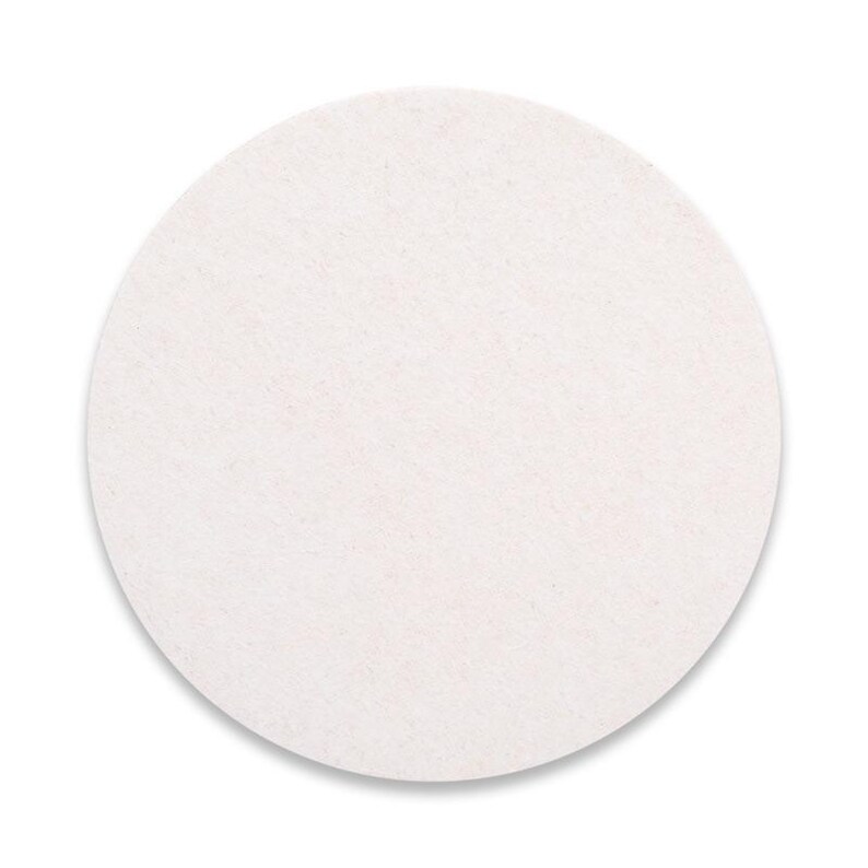 A plain, white, circular object is shown against a white background.