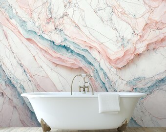 May include: A white porcelain bathtub with a towel draped over the edge, set against a wall with a pink and blue marble pattern.