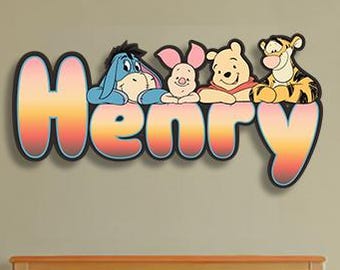 May include: A wooden bedroom set with a bed, two nightstands, and a wall decoration. The wall decoration spells "Henry" with Winnie the Pooh characters. The bed has pink bedding and a light-colored rug.