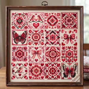 May include: A framed cross-stitch sampler featuring a grid of sixteen squares with red and pink motifs including butterflies, birds, bows, hearts, and floral patterns on a cream fabric background. The text TidyPatterns is visible in the corner.
