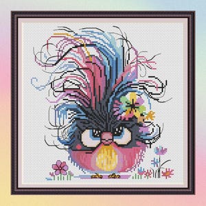 May include: A framed cross-stitch of a whimsical bird with a large, colorful crest. The bird is primarily pink, black, and blue, with floral accents. The background is white, and the frame is dark brown.