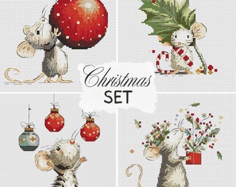 May include: A set of four cross-stitch designs featuring adorable mice with Christmas ornaments and decorations. The designs include a mouse holding a large red ornament, and another with a holly leaf. The text "Christmas SET" is also included.