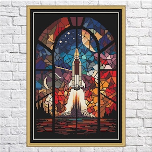 May include: A stained glass window depicting a rocket ship launching into space. The window is framed in gold and has a black background. The rocket ship is surrounded by stars, planets, and a crescent moon. The colours in the window are vibrant and colourful, including red, orange, yellow, green, blue, and purple.