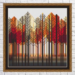 Puede incluir: Una pintura digital de una escena de bosque con árboles en tonos de naranja, rojo y amarillo. Los árboles son estilizados y geométricos, con un aspecto pixelado.