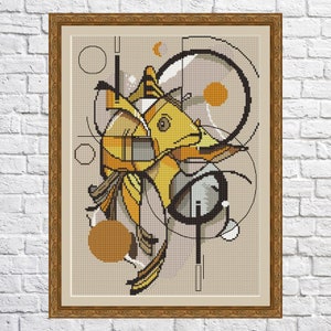 May include: A cross-stitch pattern featuring a stylized yellow fish with geometric shapes and a beige background.