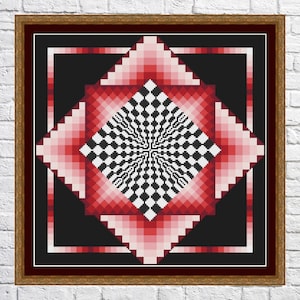 Puede incluir: Un diseño de punto de cruz enmarcado que presenta un patrón geométrico rojo y blanco con un centro a cuadros en blanco y negro. El diseño está enmarcado en un marco de madera marrón con un passe-partout rojo.