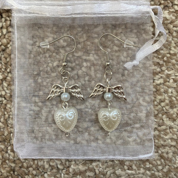 white coquette pearl angel earrings