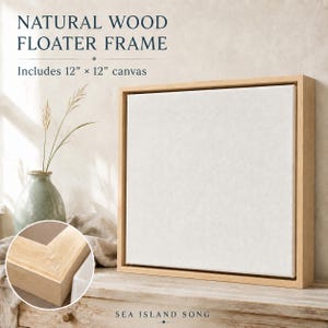 May include: A square natural wood floater frame containing a blank white canvas. The text on the image reads NATURAL WOOD FLOATER FRAME, Includes 12" x 12" canvas, and SEA ISLAND SONG. A circular inset shows a close-up of the wood frame corner.