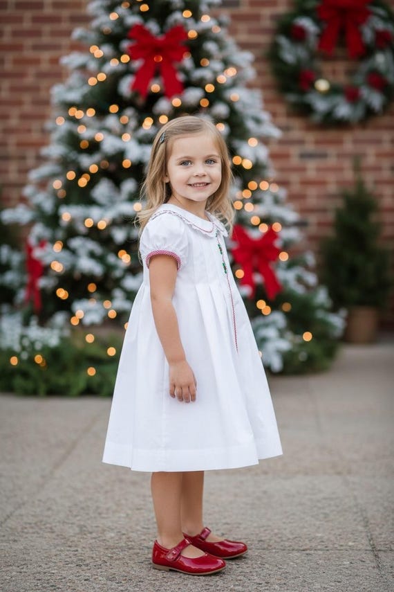 white christmas dresses Heirloom Christmas Smocked Lille Dress – Pleats and Stitches main image 1
