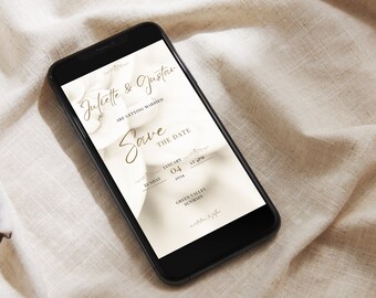May include: A smartphone screen displaying a save the date announcement for Juliette & Justar's wedding. The date is Sunday, January 04, 2024 at 4 PM. The location is Green Valley Sunmain.