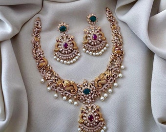 Peacock Matte Gold Finish Haram Necklace Jhumka Earrings AD Ruby Green Kemp Stones South Indian Bridal Jewelry Antique Bollywood Wedding Set