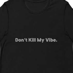 May include: Black t-shirt with white text that reads "Don't Kill My Vibe."