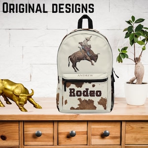 sac à dos rodéo cowboy | Cartable personnalisé, sac à dos de style occidental, sac à dos de voyage, cadeaux pour les amateurs de rodéo, motif vache unique