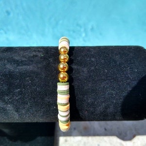 Golden sand bracelet.