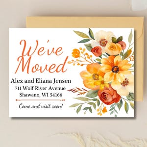 May include: A moving announcement card with the text "We've Moved" in orange script. The card features the names Alex and Eliana Jensen, new address, and a message. The design includes watercolor flowers in shades of orange, yellow, and red.