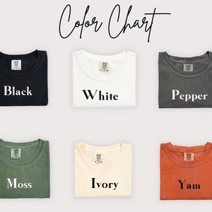 May include: Color chart showing six different t-shirt colors: black, white, pepper, moss, ivory, and yam.