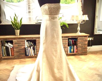 Wedding dress by Ronald Joyce.