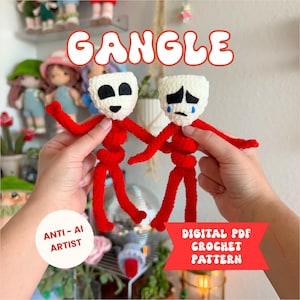 May include: Two handmade crochet dolls with white mask-like faces and red spiral bodies. One doll has black eyes and a smile, while the other has sad eyes with blue tears. The text GANGLE, ANTI-AI ARTIST, and DIGITAL PDF CROCHET PATTERN are visible.