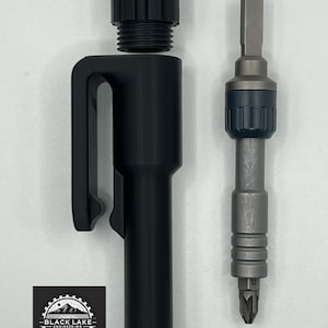 May include: Black Lake Engineering tool set. The set includes a black tool holder with a clip and a silver and black screwdriver bit. The tool holder has a threaded top. The Black Lake Engineering logo is in the lower left corner.