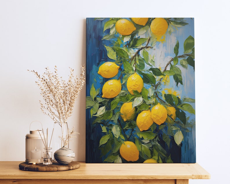 An original oil painting canvas print of vibrant lemons against a blue background. Available in multiple seizes with free shipping. Pictured leaning on a shelf