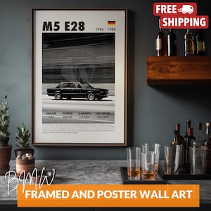 May include: A framed poster showcasing a black and white BMW M5 E28 car. The poster includes details: 3.5L engine, 286 HP, 0-60MPH in 6.5 seconds, and a top speed of 394 km/h. The text "M5 E28 1984-1988" is displayed at the top, along with the German flag.