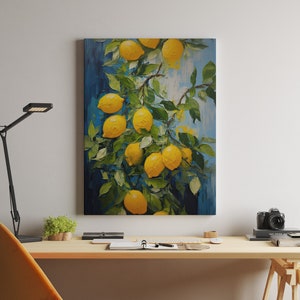 An original oil painting canvas print of vibrant lemons against a blue background. Available in multiple seizes with free shipping. Pictured hanging above a desk