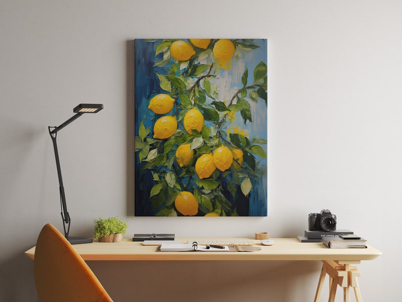 An original oil painting canvas print of vibrant lemons against a blue background. Available in multiple seizes with free shipping. Pictured hanging above a desk