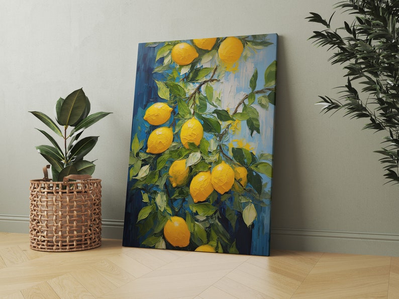 An original oil painting canvas print of vibrant lemons against a blue background. Available in multiple seizes with free shipping. Pictured leaning on a wall