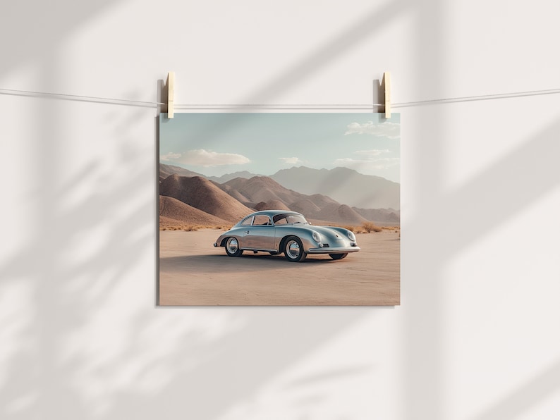 An original color car poster featuring the iconic Porsche 356 in silver in a desert. Available in  multiple sizes with free shipping.