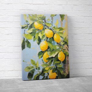 An oil painting canvas print of yellow lemons and leaves against a blue background. Available in multiple sizes with free shipping. Pictured leaning against a wall