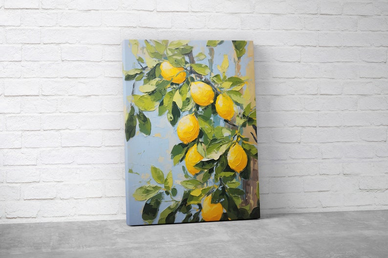 An oil painting canvas print of yellow lemons and leaves against a blue background. Available in multiple sizes with free shipping. Pictured leaning against a wall