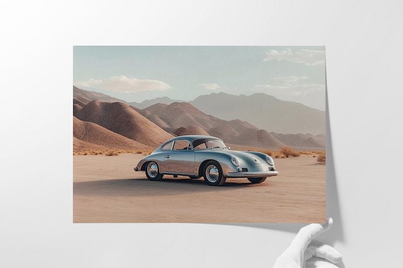 An original color car poster featuring the iconic Porsche 356 in silver in a desert. Available in  multiple sizes with free shipping.