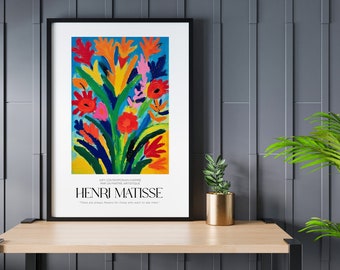 May include: A framed poster with a colorful abstract painting of flowers in shades of red, orange, yellow, green, blue, and pink. The poster is titled "Henri Matisse" and includes the text "Art Contemporain Inspire Par Un Maitre Artistique." The text "There are always flowers for those who want to see them." is also included.