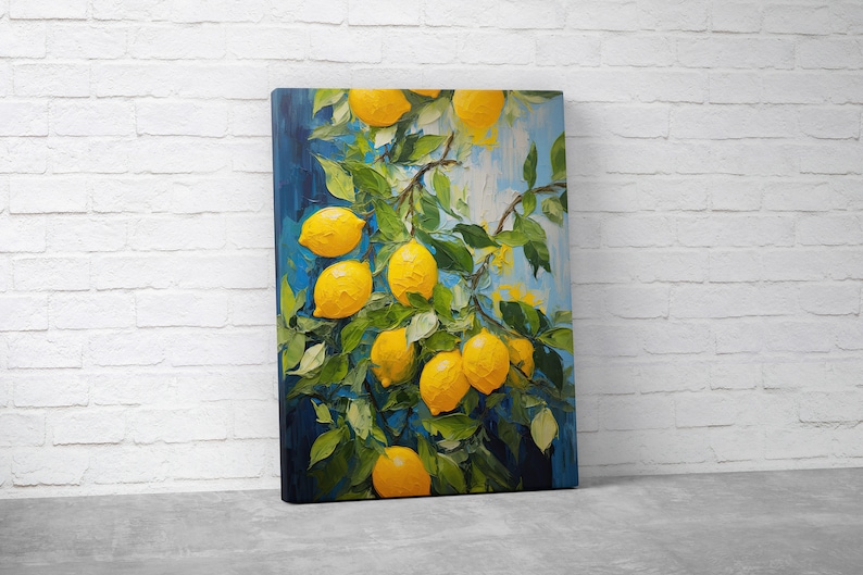 An original oil painting canvas print of vibrant lemons against a blue background. Available in multiple seizes with free shipping. Pictured leaning on a wall