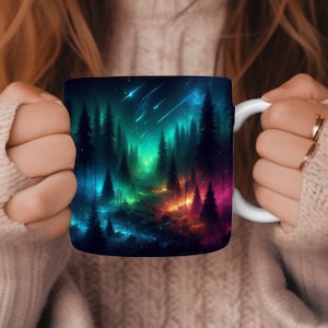 May include: A white ceramic mug featuring a colourful forest scene. The scene depicts a dark forest with tall trees, a glowing blue and green sky, and shooting stars.