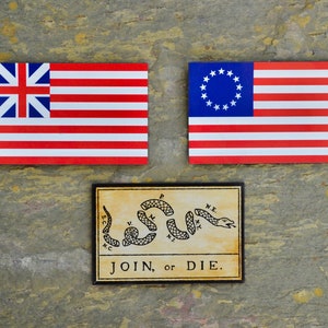 Imanes con las banderas de la revolución