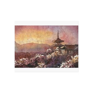 May include: Watercolor print of a Japanese pagoda on a hillside, set against a sunset sky. The artwork features a detailed depiction of the traditional architecture, with a blend of purple, orange, and brown hues. The print evokes a sense of tranquility and cultural appreciation.