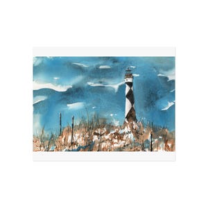May include: Watercolor painting of a lighthouse with black and white diamond pattern. The lighthouse stands on a rocky outcrop with grass and vegetation. The sky is blue with white clouds.