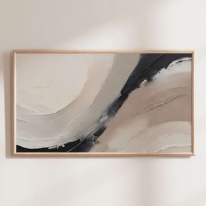 May include: Abstract painting in a wooden frame with a black, white, and beige color scheme. The painting features flowing, organic shapes and textures.