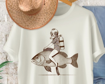 Surreal Woman Riding Fish T-Shirt Abstract Art Fishing Lover Tee Unique Surrealist Artistic Fishing Shirt for Art Enthusiasts Fisherman
