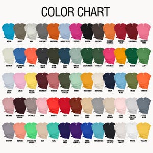 May include: Color chart showing 48 different t-shirt colors. The colors are arranged in rows and columns, with each color labeled with its name.