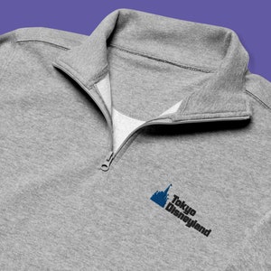 Tokyo Disneyland Embroidered Fleece Quarter Zip | Subtle Disney Apparel
