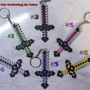 Pixel Sword Keychain: Gamer-Inspired Plastic Accessories